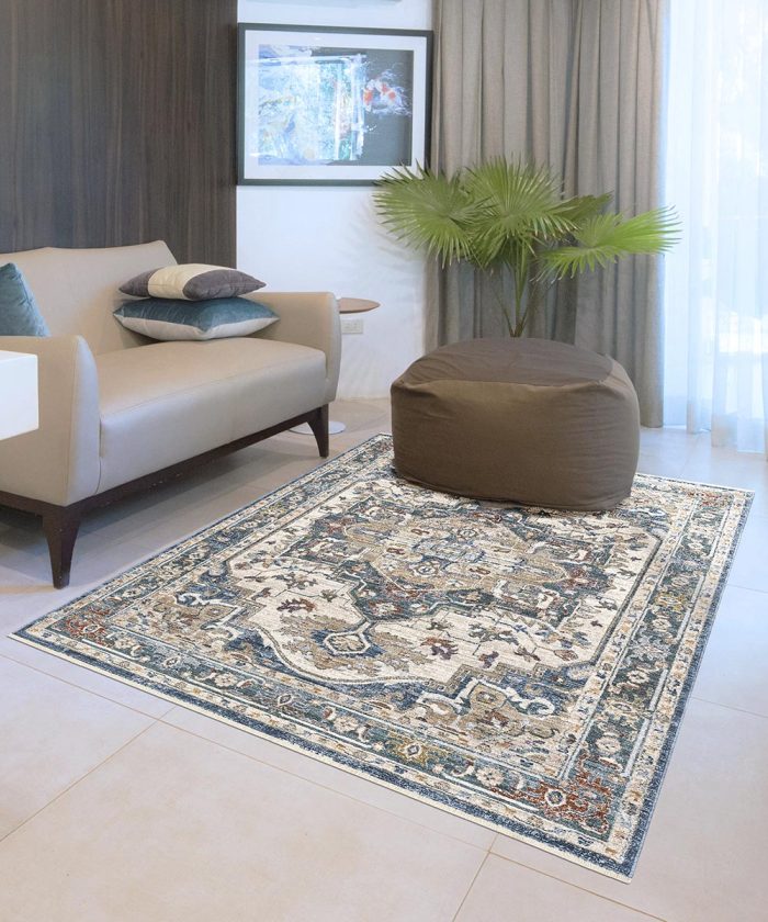 Salotto con Tappeto arredo verde e blu in stile classico persiano. Tappeto MURCIA per casa: soggiorno, camera e sala.