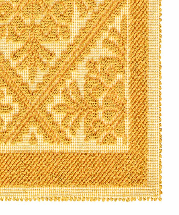 Dettaglio del Tappeto Sardo Giallo 100% cotone e prodotto in Sardegna Italia. Tappetino bagno passatoia lavabile.