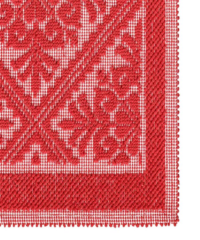 Particolare del Tappeto Sardo Rosso 100% cotone e prodotto in Sardegna Italia. Tappetino bagno passatoia lavabile.