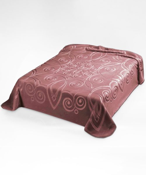 Coperta tinta unita rosa opale, calda e morbida con pelo effetto velluto. Disponibile per letto singolo e matrimoniale, fabbricata in Spagna.