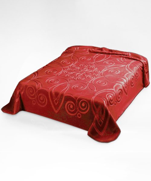Coperta tinta unita rosso, calda e morbida con pelo effetto velluto. Disponibile per letto singolo e matrimoniale, fabbricata in Spagna.