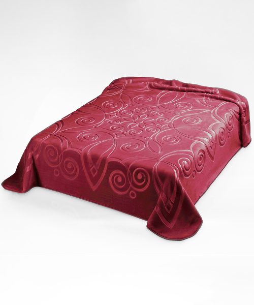 Coperta tinta unita rosso fragola, calda e morbida con pelo effetto velluto. Disponibile per letto singolo e matrimoniale, fabbricata in Spagna.