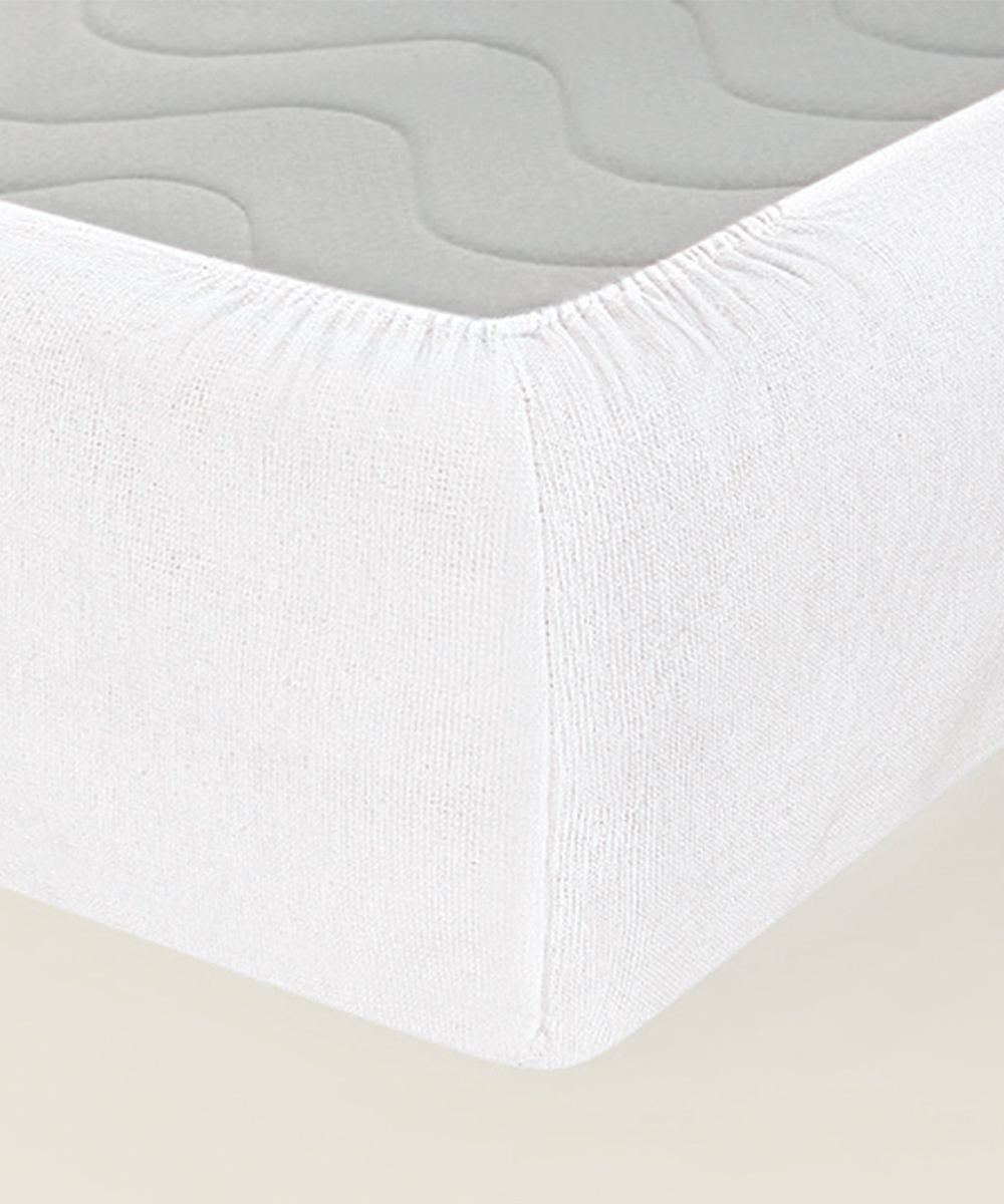 Angolo del Coprimaterssao Florence in cotone 400 grammi al metro quadro, 100% prodotto in Italia. Letto singolo e matrimoniale, altezza 30 cm con angoli elasticizzati.