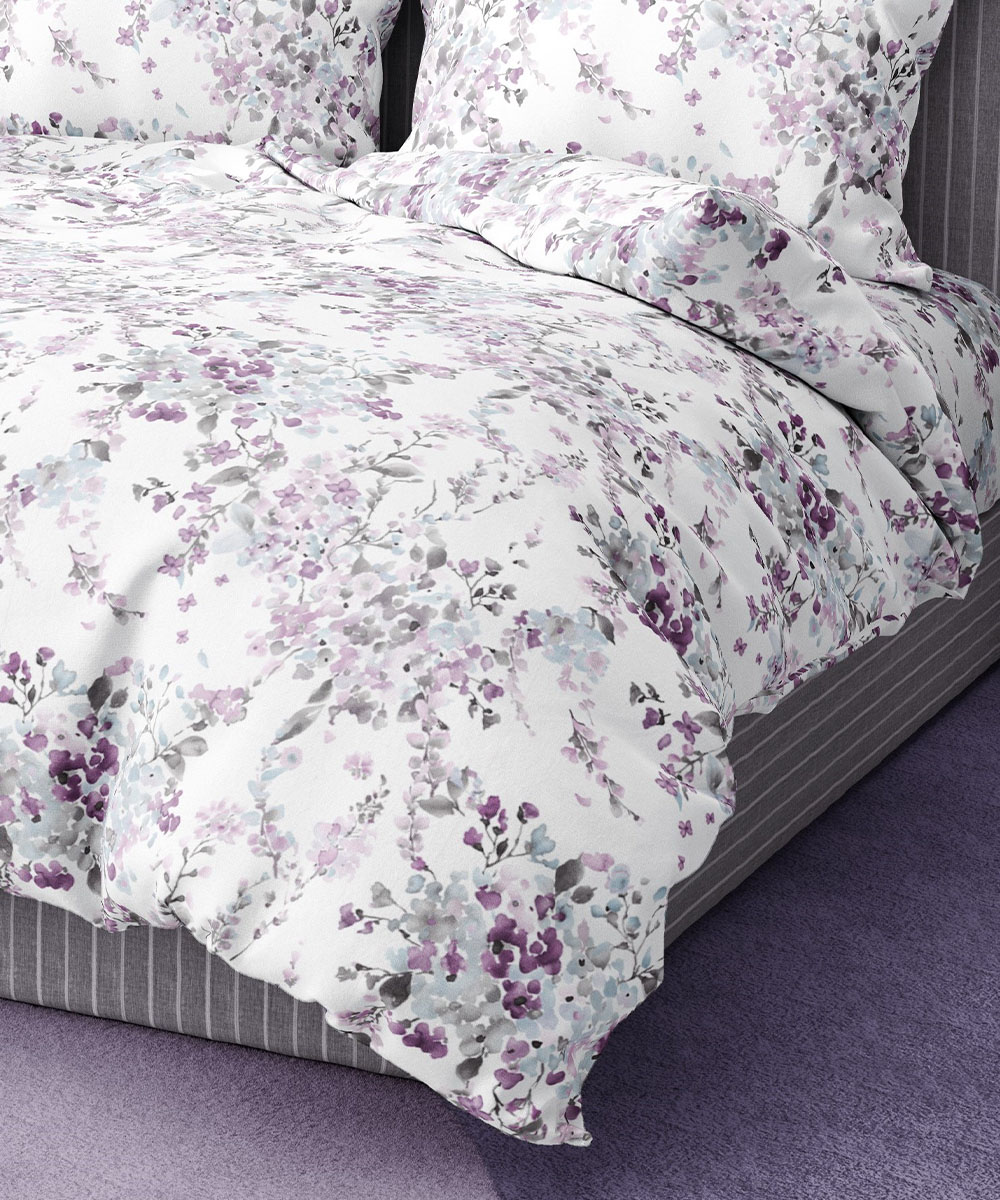 Dettaglio Parure Copripiumino Quadrifoglio Fantasia disegno acquerello motivo floreale. In cotone e 100% prodotto in Italia. Disponibile sia per letto singolo che per letto matrimoniale.