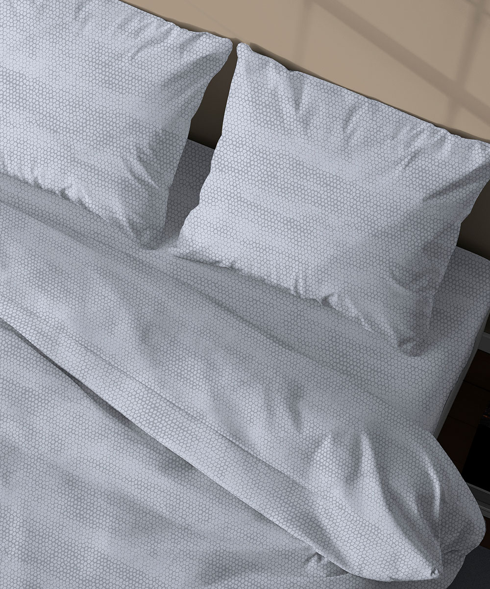 Dettaglio Parure Copripiumino Quadrifoglio Fantasia disegno bon bon grigio. In cotone e 100% prodotto in Italia. Disponibile sia per letto singolo che per letto matrimoniale.