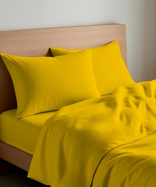 Completo Lenzuola Quadrifoglio Tinta Unita Giallo. In cotone e 100% prodotto in Italia. Disponibile per letto singolo, piazza e mezza e matrimoniale.