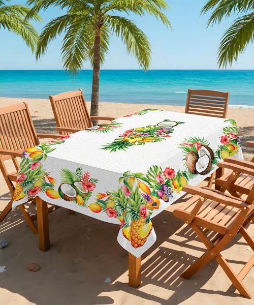 Tavolo in spiaggia con Tovaglia in cotone con stampa digitale e Prodotta in Italia. Disegno frutta tropicale esotica multicolore su sfondo bianco. Due misure per tavoli da 6 e da 12 persone.