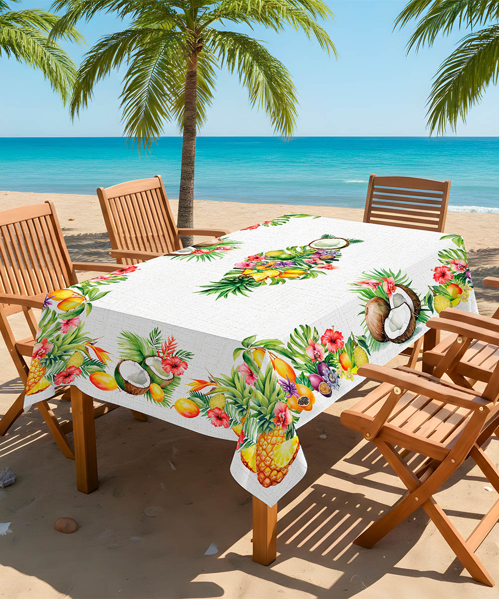 Tavolo in spiaggia con Tovaglia in cotone con stampa digitale e Prodotta in Italia. Disegno frutta tropicale esotica multicolore su sfondo bianco. Due misure per tavoli da 6 e da 12 persone.